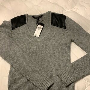 Brand: BCBG Maxazria 
Women's pullover sweater with Shoulder patch